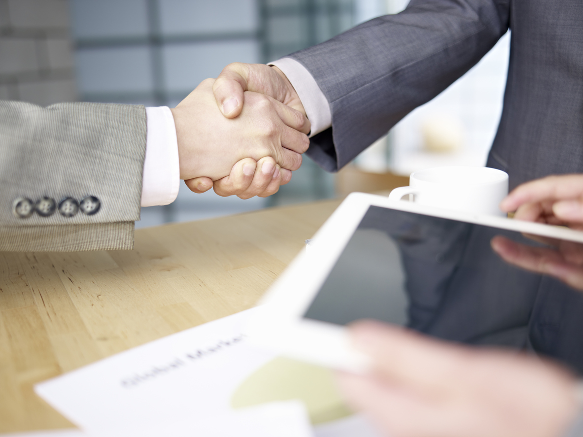 business people shaking hands
